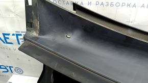 The wiper grille is plastic and faded on a Toyota Highlander 20-25.