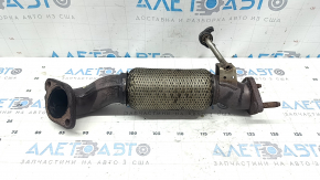 Kia Sportage 17-22 2.4 FWD exhaust pipe has a torn mesh and is rusty.