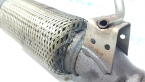 Kia Sportage 17-22 2.4 FWD exhaust pipe has a torn mesh and is rusty.