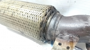 Kia Sportage 17-22 2.4 FWD exhaust pipe has a torn mesh and is rusty.