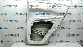 Kia Sportage 17-22 white UD rear right door, bare, dented