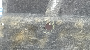 The rear underbody protection of the Toyota Highlander 20-22 is worn and torn.
