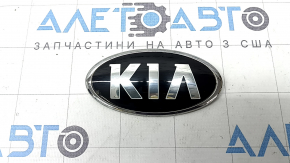 The Kia Sportage 17-22 trunk lid emblem has bulged.
