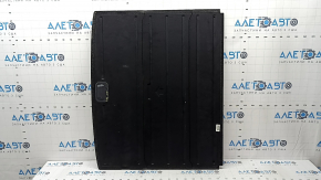 The trunk floor of a Kia Sportage 17-22 is black, with scratches on the handle.