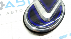 The Lexus RX450h tailgate badge emblem has faded.