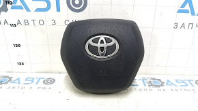 The driver's side airbag in the Toyota Camry V70 18-24 is black and has a rusty squib.
