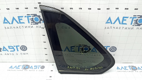 Rear left Toyota Rav4 19-24 window, tinted, with chrome molding, scratches, torn seal
