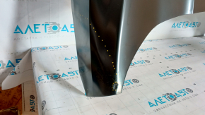 The hood of a Ford Ecosport 18-22 is bare steel, with a dent and a broken corner.