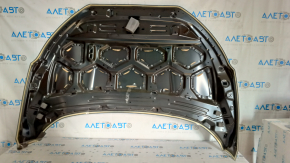 The hood of a Ford Ecosport 18-22 is bare steel, with a dent and a broken corner.