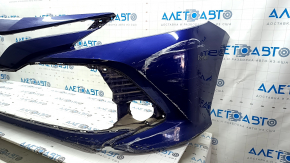 Front bumper, bare, Toyota Camry v70 18-20 LE/XLE, without parking sensors, blue, with tears, broken fasteners, scratches, and dents.