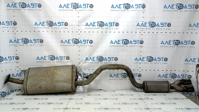 The rear muffler, resonator, and barrel of the Toyota Highlander 20-22 XSE 3.5 are dented.