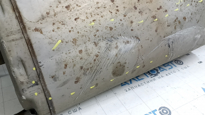 The rear muffler, resonator, and barrel of the Toyota Highlander 20-22 XSE 3.5 are dented.
