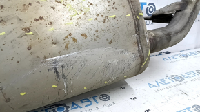 The rear muffler, resonator, and barrel of the Toyota Highlander 20-22 XSE 3.5 are dented.