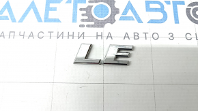 The "LE" emblem on the tailgate of the Toyota Rav4 19-24