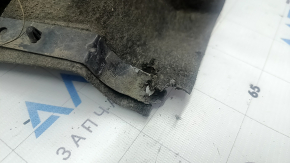 The front right fender liner of a Toyota Rav4 19-24 has a torn mount.