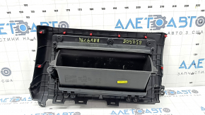 The glove compartment of a Toyota Rav4 19-21 is black and has scratches.