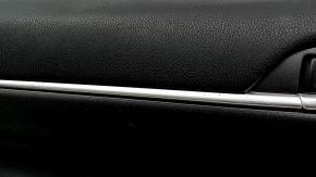 Front left door panel for Toyota Camry v70 18-23, black with black plastic insert, rubber armrest, with handle, nicks on molding, scratches