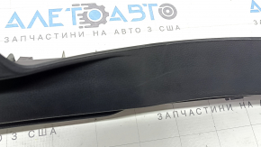 The trunk opening trim for a Toyota Rav4 19-24 is black, with scratches and whitened plastic.