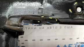 The left underbody protection of a Toyota Camry v70 18-24 is torn.