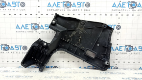 The rear left underbody protection of a Toyota Camry v70 18-24 hybrid is torn.