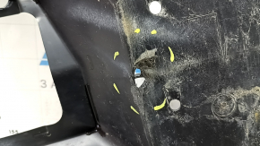 The rear left underbody protection of a Toyota Camry v70 18-24 hybrid is torn.