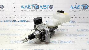 The brake master cylinder with reservoir for a Toyota Camry V70 18-19 hybrid has a broken cap.