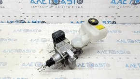 The brake master cylinder with reservoir for a Toyota Camry V70 18-19 hybrid has a broken cap.
