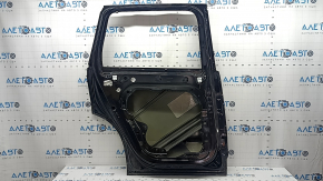 The bare rear left door of a Volvo XC90 16-22 black 717, dents, bump