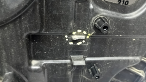 The inner rear left door panel of a Volvo XC90 16-23 has a broken mount.