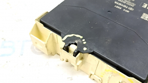 The Multiplex Network Control Module for Toyota Camry v70 18-24 has a broken mount.