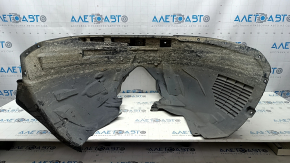 The front right fender liner of a Volvo XC90 16-23 is torn, non-factory holes
