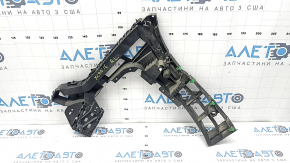 The rear bumper mount, left, Volvo XC90 16-19, is broken.