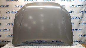 The hood of a Honda CRV 23-25 is bare steel, with damaged edges and corners.
