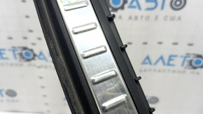 Volvo XC90 16-19 black trunk opening trim with metal inserts, scratches, bumps