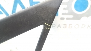 The dashboard trim with air vents on a Hyundai Sonata 11-15 is cracked.