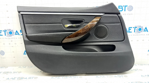 Front left door panel for a BMW 4 Series F36 15-20 Gran Coupe, with backlighting, black leather, wood trim, peeling handle cover, broken mount, scratches, dents, needs cleaning