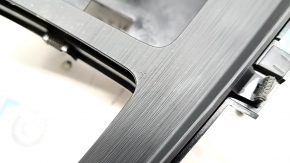 The center console trim with cup holders for the Audi A5 F5 17-19 is black, ebony-like, and the coating is swollen.