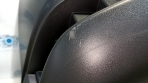 Bare rear bumper of a 17-20 Nissan Rogue without parking sensors, scratches