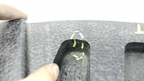 The front bumper absorber of a Subaru Forester 19-21 SK is dented, there is a crack in the fasteners