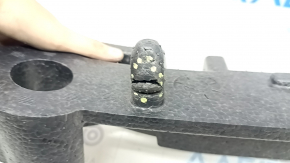 The front bumper absorber of a Subaru Forester 19-21 SK is dented, there is a crack in the fasteners