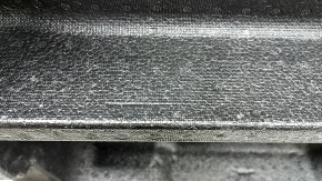 The central foam of the trunk of the Subaru Forester 19-24 SK is dented.