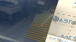 The front left door of a Subaru Forester 19-24 SK blue SAZ is bare and has split at the seam.