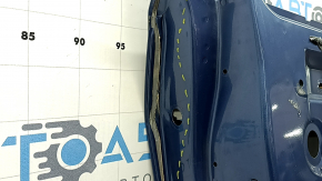 The front left door of a Subaru Forester 19-24 SK blue SAZ is bare and has split at the seam.