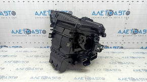 The bare heater housing of the Audi A5 F5 18-25 air conditioner has a broken mount.
