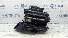 The bare heater housing of the Audi A5 F5 18-25 air conditioner has a broken mount.
