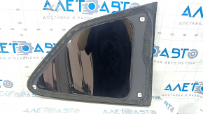 Subaru Forester 19-24 SK rear left window with scratches on the molding