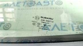 Subaru Forester 19-24 SK rear left window with scratches on the molding