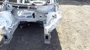 Front left quarter panel of a 2020 Nissan Ariya on a white XGA body