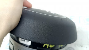 The steering wheel airbag for the driver's side of the Audi A6 C7 12-18 is black and scratched.