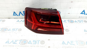 Left outer fender light for an Audi A6 C7 16-18, with scratches.